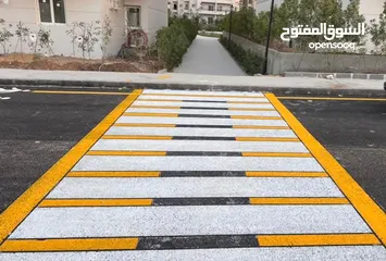  1 تخطيط طرق (دهان طرق) تحديد مواقف و الكراجات و المصفات