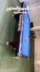  2 طاولة بلياردو امريكي شبه جديدة وطوايل وكراسي وثلاجة وشاشات بسعر حلو