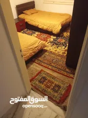  4 شقة بالدور الاول في "وسط البلاد "طرابلس مفروشه كاملا (اربعه غرف وشرفتين ومنور وسط حوش2 وحمام ومطبخ).