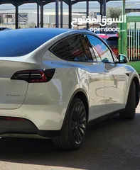  6 TESLA MODEL Y 2022 LONG RANGE   DUAL MOTOR  فحص اوتوسكور B+ بحاله الوكالة