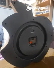  3 ساعه حائط علي شكل ابل بحال الوكاله