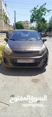  12 كيا ريو موديل 2016 للبيع لون بني خارجي وداخلي بيج
