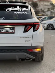  16 هونداي توسان ترخيص 2022 محرك 1600 هايبرد plug in/يقطع على الشحنه 65 كيلو متر  271 حصان