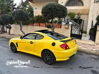 14 هونداي توسكاني شكل 2005 كامله الاضافات