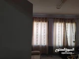  2 الدوار /مقابل التل الاخضر مجمع الحواري التجاري