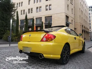  27 هونداي توسكاني شكل 2005 كامله الاضافات