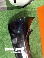  5 طمبون خلفي بريوس سي2012-2014  مستعمل اصلي ياباني بحالة جيده موضوح بصور  Toyota Prius c2012-2014