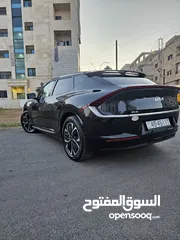  9 كيا ev6 كهرباء 2023   وارد اميركي ممشى قليل     جميع الاضافات اعلى صنف عدا الفتحة  موديل 2023