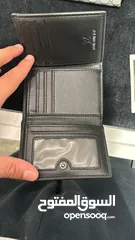  2 Replica Louis Vuitton wallet good condition