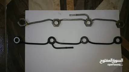  8 قطع غيار بكب متسوبيشي ماغنوم موديل 2005 وعاكسات طريق