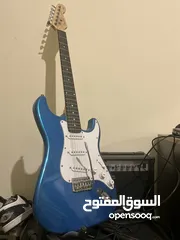  1 Fender electric guitar