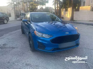  4 فورد فيوجن 2019 se جمرك حديث لم تعمل تطبيقات مالك اول للسياره فحص 4 جيد لون مميز كحلي