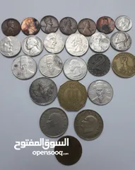  18 عملات معدنية قديمة كما موظح بالصور