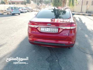  17 بسم الله ما شاء الله   فورد فيوجن 2017 لون خمري مميز للبيع ورقم مميز 7جيد فحص كامل للبيع