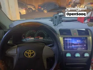  6 تويوتا كامري  2007  GLX  ذهبي تخشيبة وستارة خلفية  شاشة وكاميرا