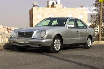  4 مرسيدس E200  موديل 1999 فل مع فتحة