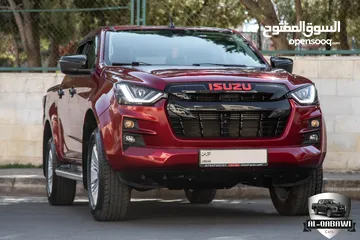  3 Isuzu D-Max 2023 Ls   البكب وارد و كفالة الشركة و قطعت 20,000 كيلو متر