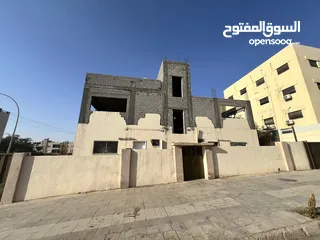  2 نص عمارة سكنية للبيع في منطقة الثالثة – العقبة