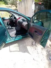  13 بيجو 206 موديل 2002