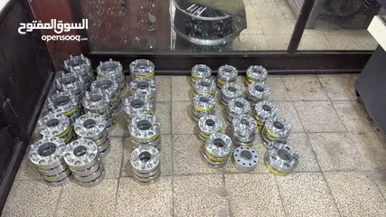  1 فلنجات جميع أنواع السيارات وسبيسرات وبراغي وسومين جيرمين