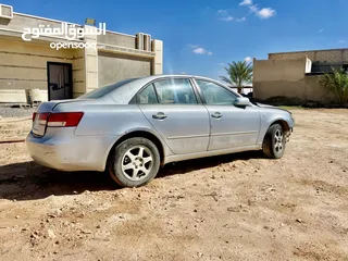  4 سيارة سوناتا2006/2005 السيارة فيها خبطة في الرفرف اليسار وجيهة الإطار الأمامي اليسار والفخدة اليسار