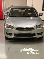  8 ميتسوبيشي لانسر 2016 كرت ابيض