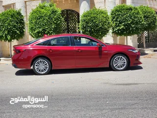  25 تويوتا افالون لون خمري حره جديد باسم المستورد 2021 فحص 3 جيد أعلى صنف بالاضافات بطاريه ليثيوم بسعر