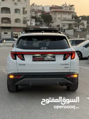  14 هونداي توسان ترخيص 2022 محرك 1600 هايبرد plug in/يقطع على الشحنه 65 كيلو متر  271 حصان