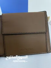  4 محفظة رجالي ماركة Michael kors الأصلية جلد طبيعي مميزة بحال الوكاله