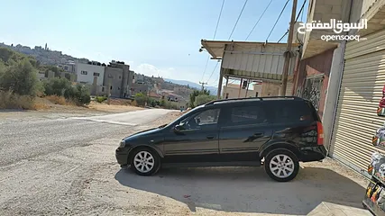  5 أوبل استرا ستيشن 99 اتماتيك بنزين متور 1600 ضبل فحص ممتاز ترخيص تامين