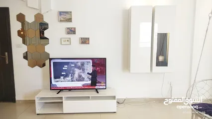  1 بوفيه و طاولة تلفزيون