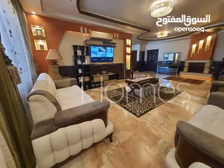  9 شقة ارضية معلقة مع ترس للبيع في حي الصحابة بمساحة بناء 177م