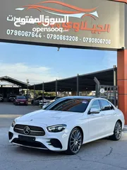  2 مرسيدس E350 2021 فل اضافات اعلى صنف AMG وارد المانيا ممشى قليل لون لؤلؤي