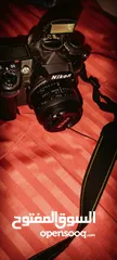  4 Nikon D7000 with 50mm 1.8F lens مع البطارية والشاحن وعدسه شبه جديده