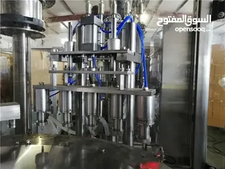  14 ماكينة تعبئة واغلاق أكياس العصير والكريمات والزيوت والمياه وغيرها
