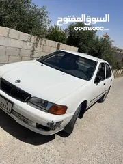  2 نيسان صني 1999 وارد ياباني ماتور 1500 قطارة بنزين ...... قابل للتفاوض والشرا ما بقصر معه ...