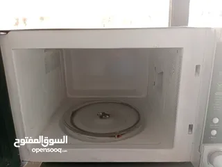  7 ميكرويف مع فرن حجم كبير/شغال 100/100لون سلفر للبيع المستعجل