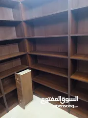  1 رفوف مكتبيه