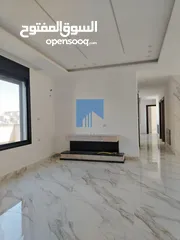  17 شقة أرضية فاخرة للبيع في خلدا  - خلف المستشفى السعودي 330م مع حديقة وترسات 100م لم تسكن