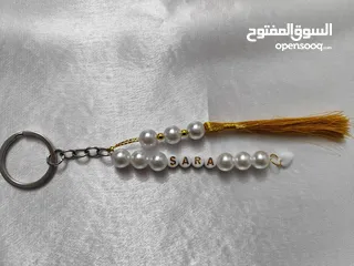  16 ميداليات واساور وتوزيعات أعراس وحقائب من الخرز