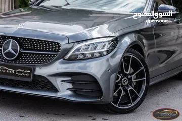  3 Mercedes C200 2019 Mild hybrid Amg kit Night Package   السيارة وارد الشركة و قطعت مسافة 83,000 كم