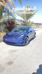  1 TESLA  MODEL ( 3 ) 2023 فحص اربعه جيد اوتوسكور كحلي داخلي اسود ممشى قليل  b+