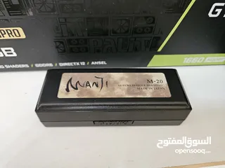  4 Suzuki Manji Harmonica C with the box clean