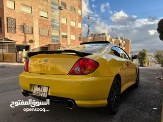  12 هونداي توسكاني شكل 2005 كامله الاضافات