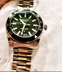  7 ساعة رجالية   Gucci  YA136301  Men's Dive  Stainless Steel   Chronograph Watch 40mm