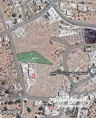  4 أرض بمساحة 2.257 م2 قرية صروت حوض البلد منطقة مرتفعة وإطلالة مميزة