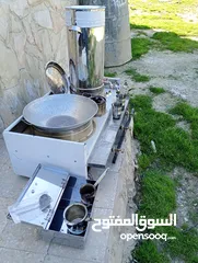  2 عدة قهوه غاز ثلاث عيون سخان ماء صينيه معالق ومعلقة عيار وحافضه