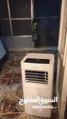  1 *مكيف غاز متنقل*