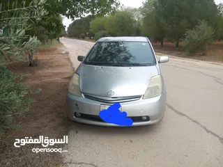  1 ويوتا بريوس 2007 الفحص مرفق مع الصور بطارية هايبرد جديد الوكاله جير جديد abs جديد بواجي وكوابل جديد