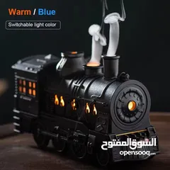  1 قطار البخار الصغير مش بس ملطف جو... تحفة فنية تنفث راحة وعطر! عيش تجربة بخار خرافية... جو دافئ،
